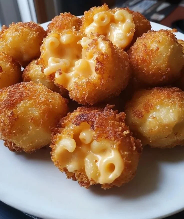 Fried Mac and Cheese Bites served on a plate, crispy golden and cheesy.