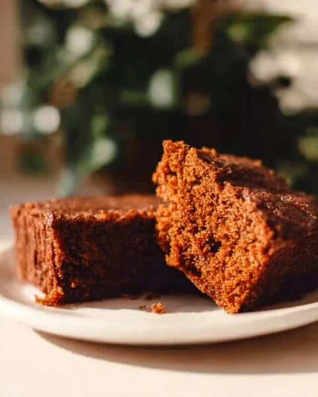 Delicious flourless oatmeal carrot cake topped with cream cheese frosting