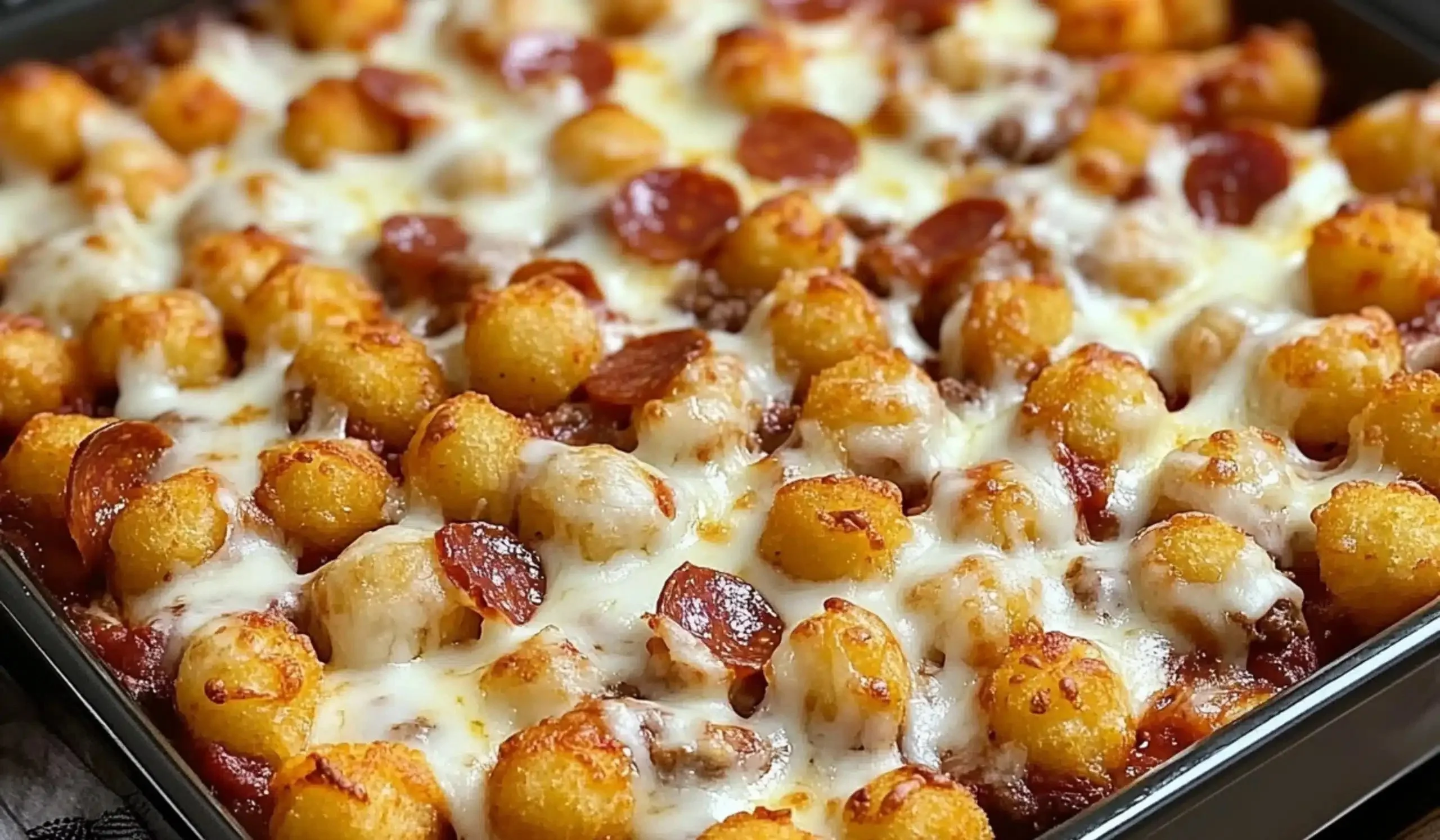 Delicious Pizza Tot Casserole with melted cheese and crispy tots.